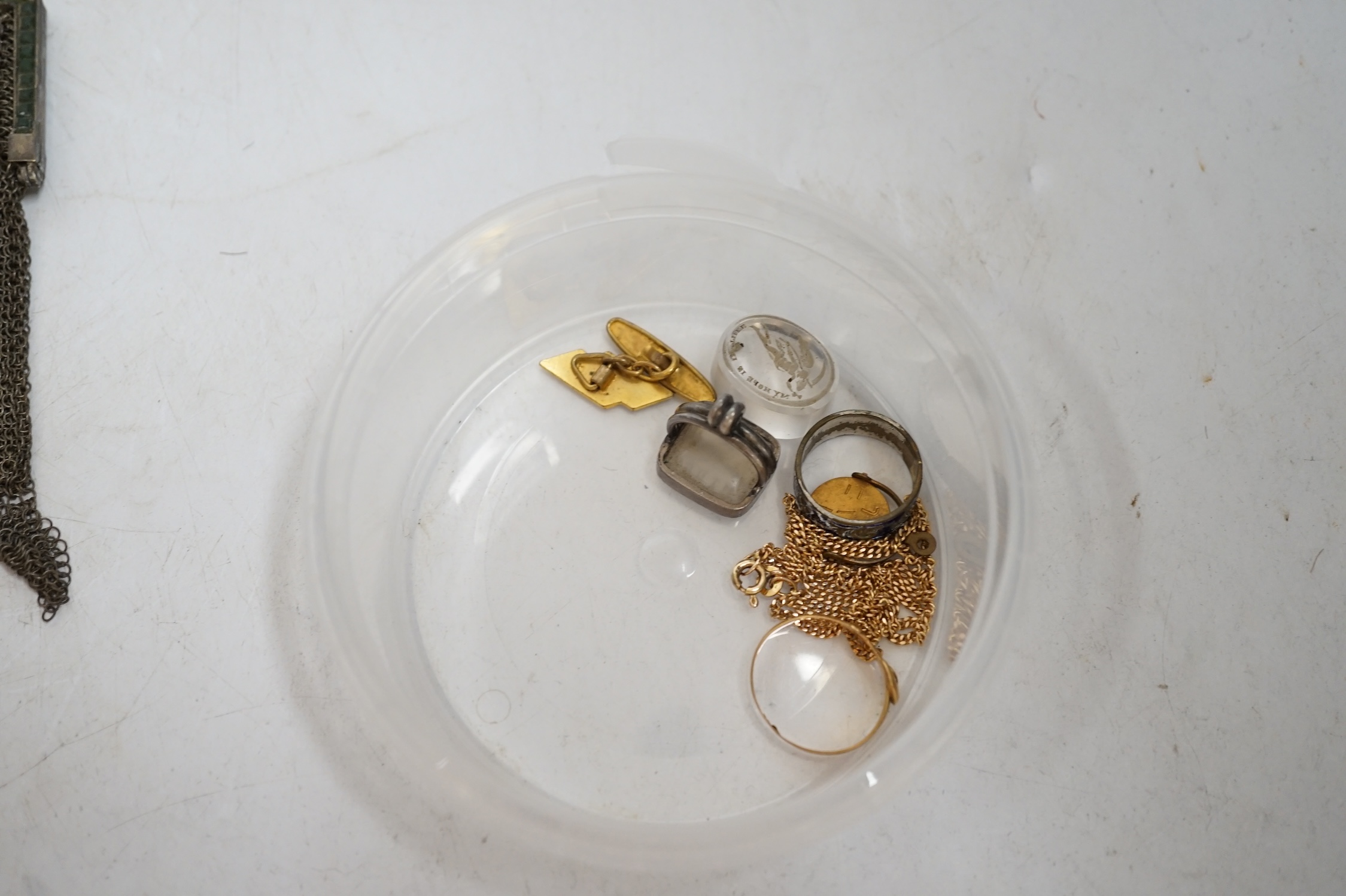A quantity of mixed collectables and jewellery to include a Victorian gold buckle ring (hallmarks rubbed), a gilt metal 'I Love You' spinner charm, a 9ct gold curb link chain, cut steel buckles, etc. Condition - varies,